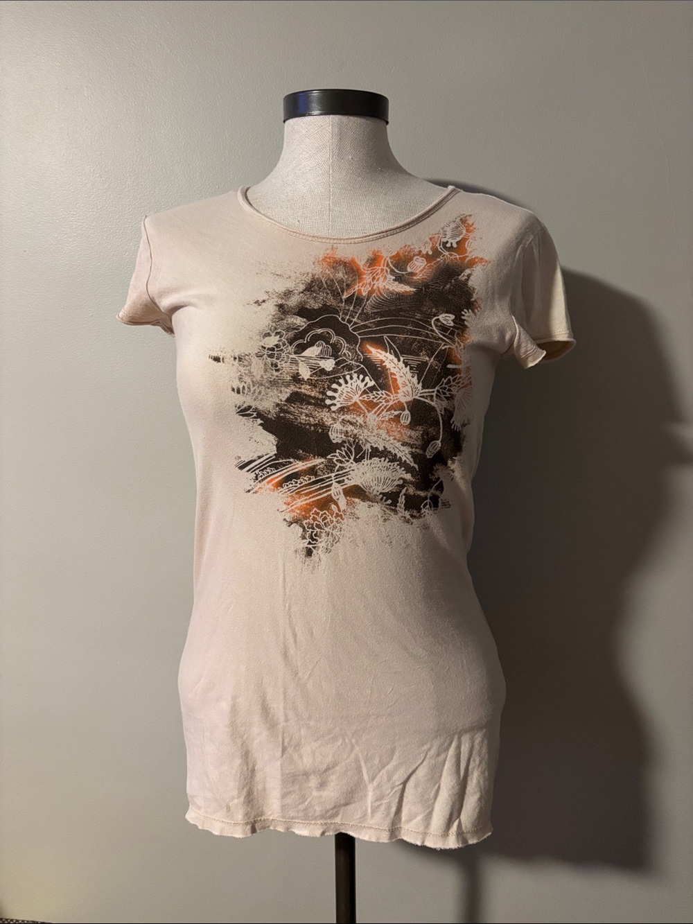 The Limited Light Pink Graphic Short Sleeve Tee with Black & Orange Art